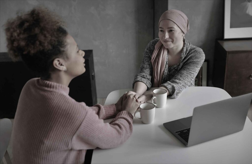 woman-holding-hands-to-get-ahead-of-depression-through-connection.jpg