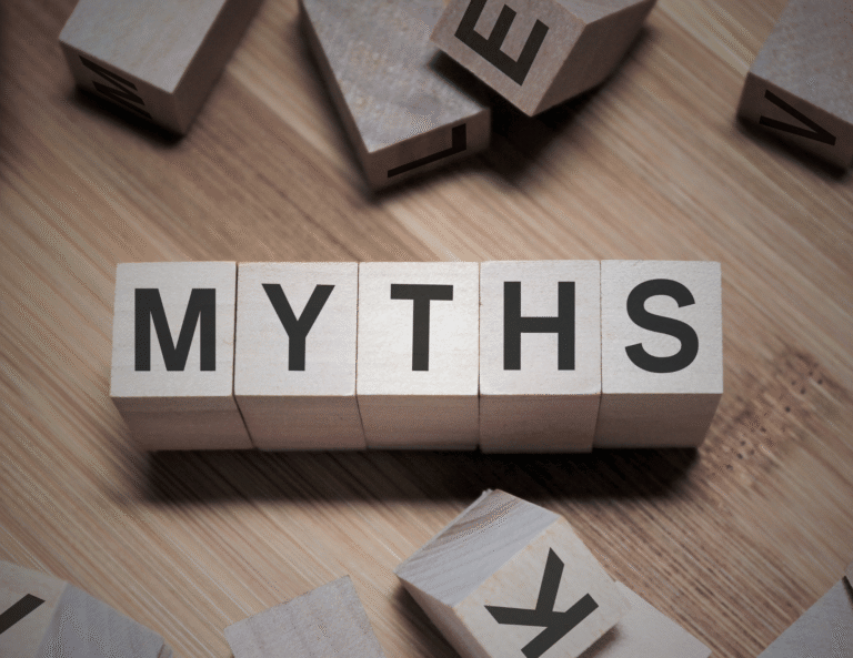 Letter blocks arranged to spell the word myths, representing mental health misconceptions