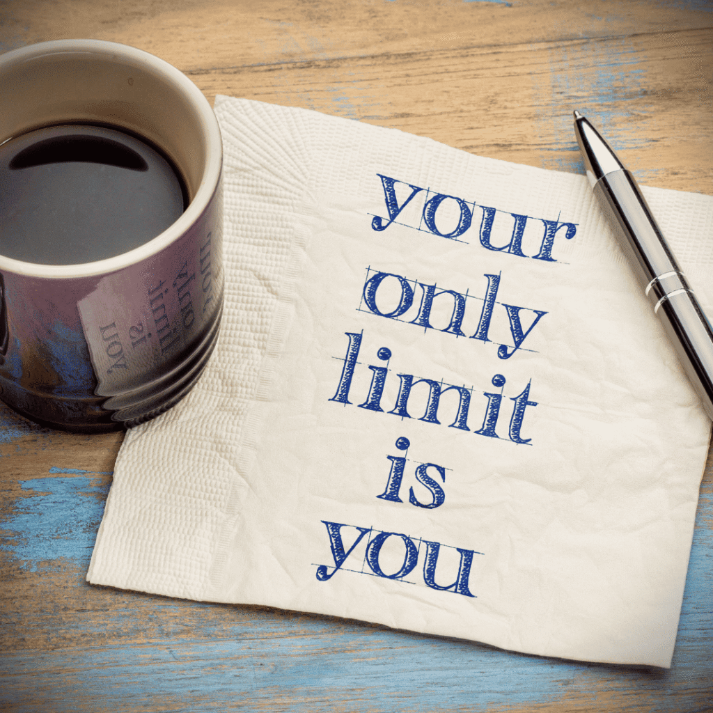 A coffee cup next to a tissue paper with the phrase “Your only limit is you,” representing negative self-talk as an insidious habit that affects confidence and growth.